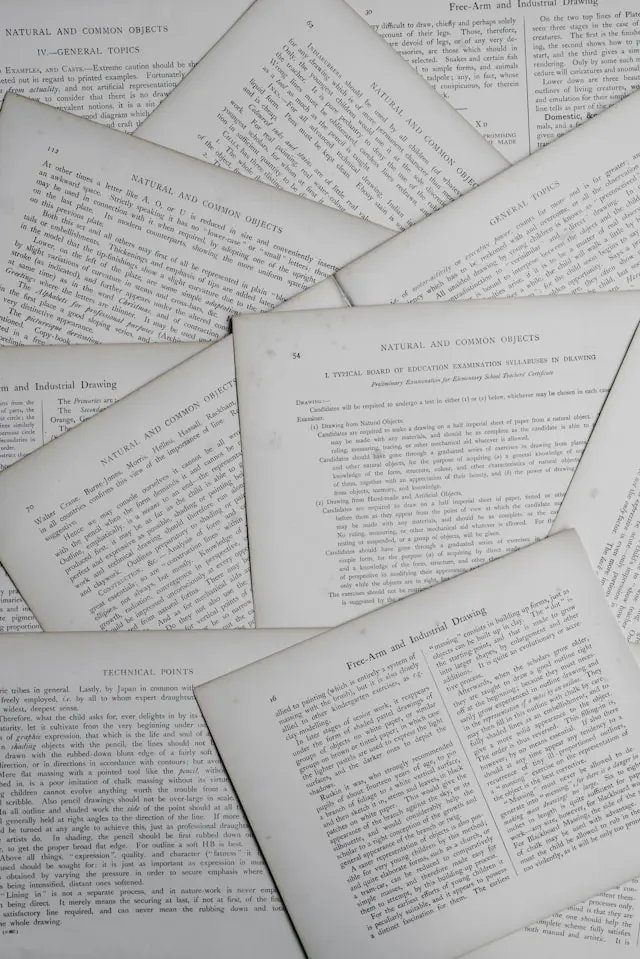 several flat sheets of paper overlapped