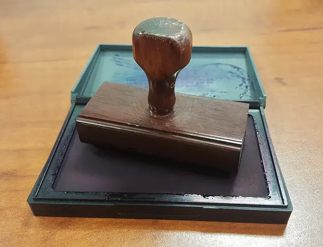 stamp with ink pad on a table